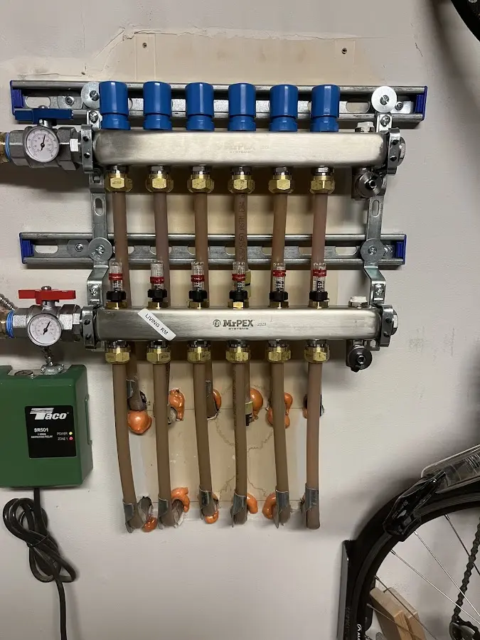 Plumber performing Gas Leak Detection at a residential property in Washington